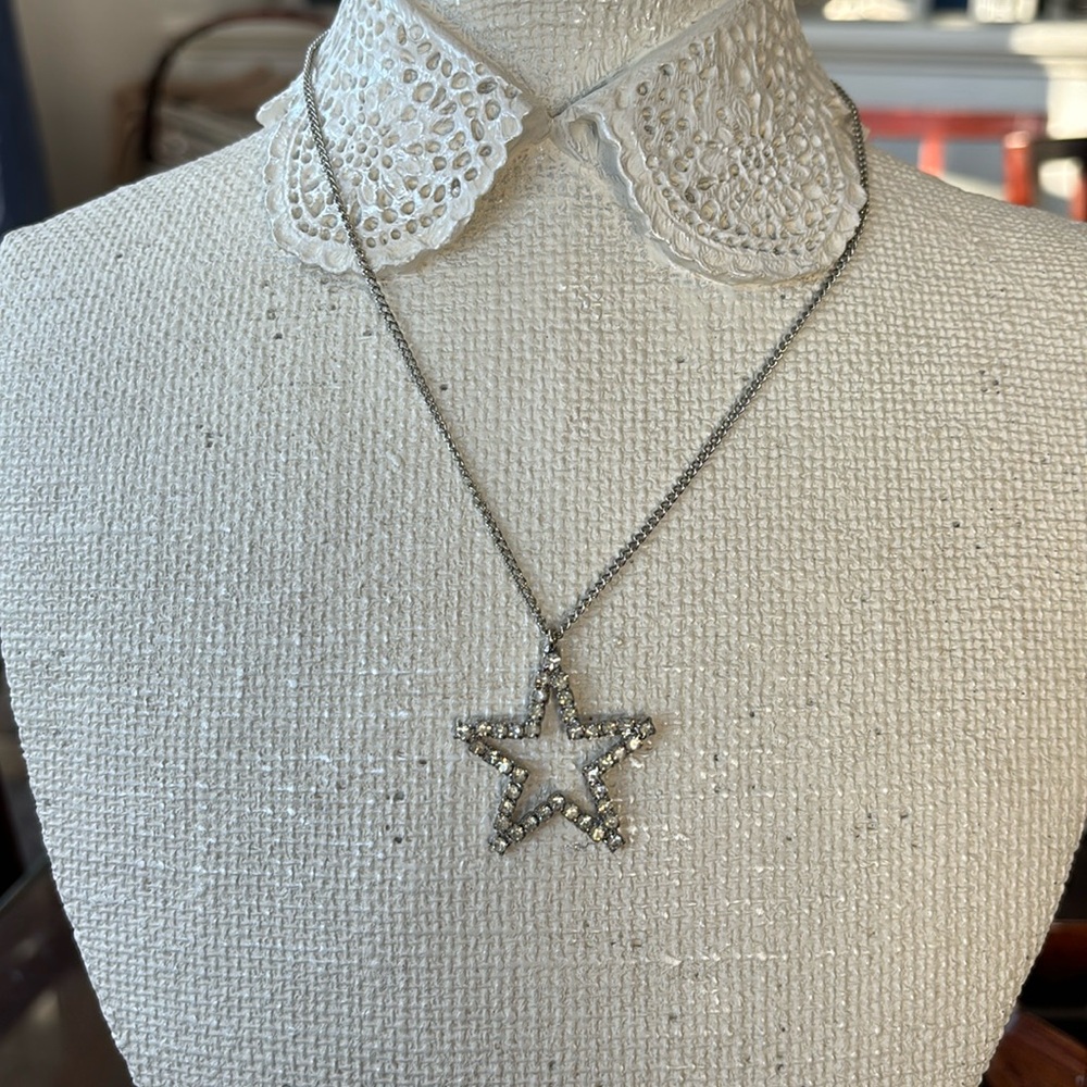 Silver Star necklace.